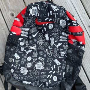 Nike backpack Black and white with red logo